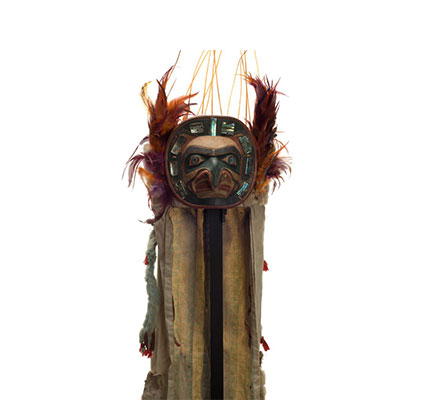 Yaxwiwe' or Hawk Headdress, abalone shell encircles hawk face on frontlet, feathers and sea lion whiskers above and at sides, long ermine and cotton train.