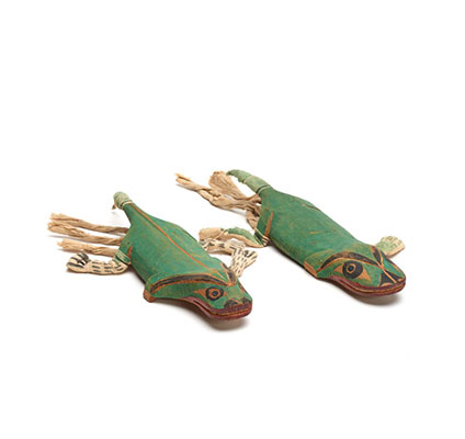 Two carved salamander figures, attached to forearms with string, painted bright green, part of a Bak´was or Wild Man of the Woods costume