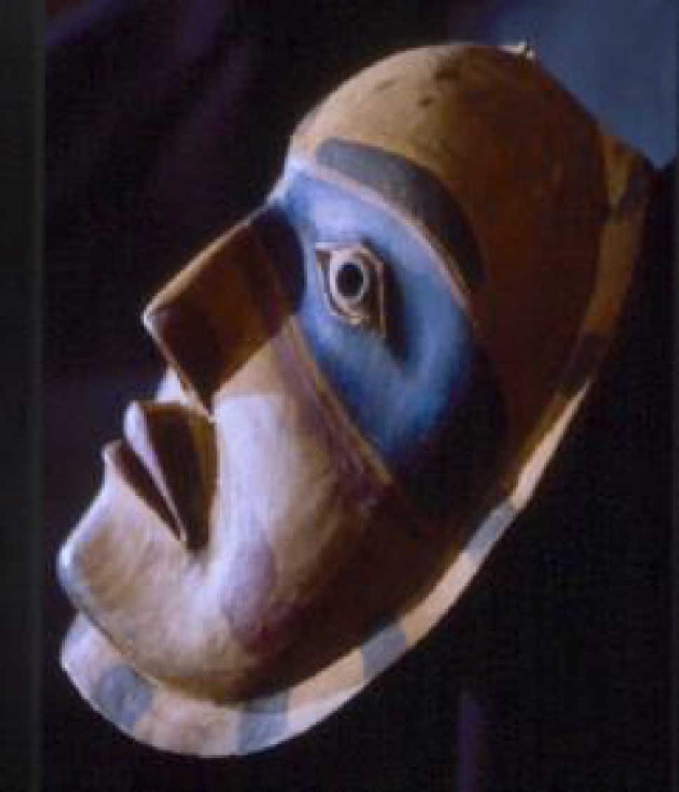 Alternate colour photograph of ’Makwala - Moon mask side view shot against a black background