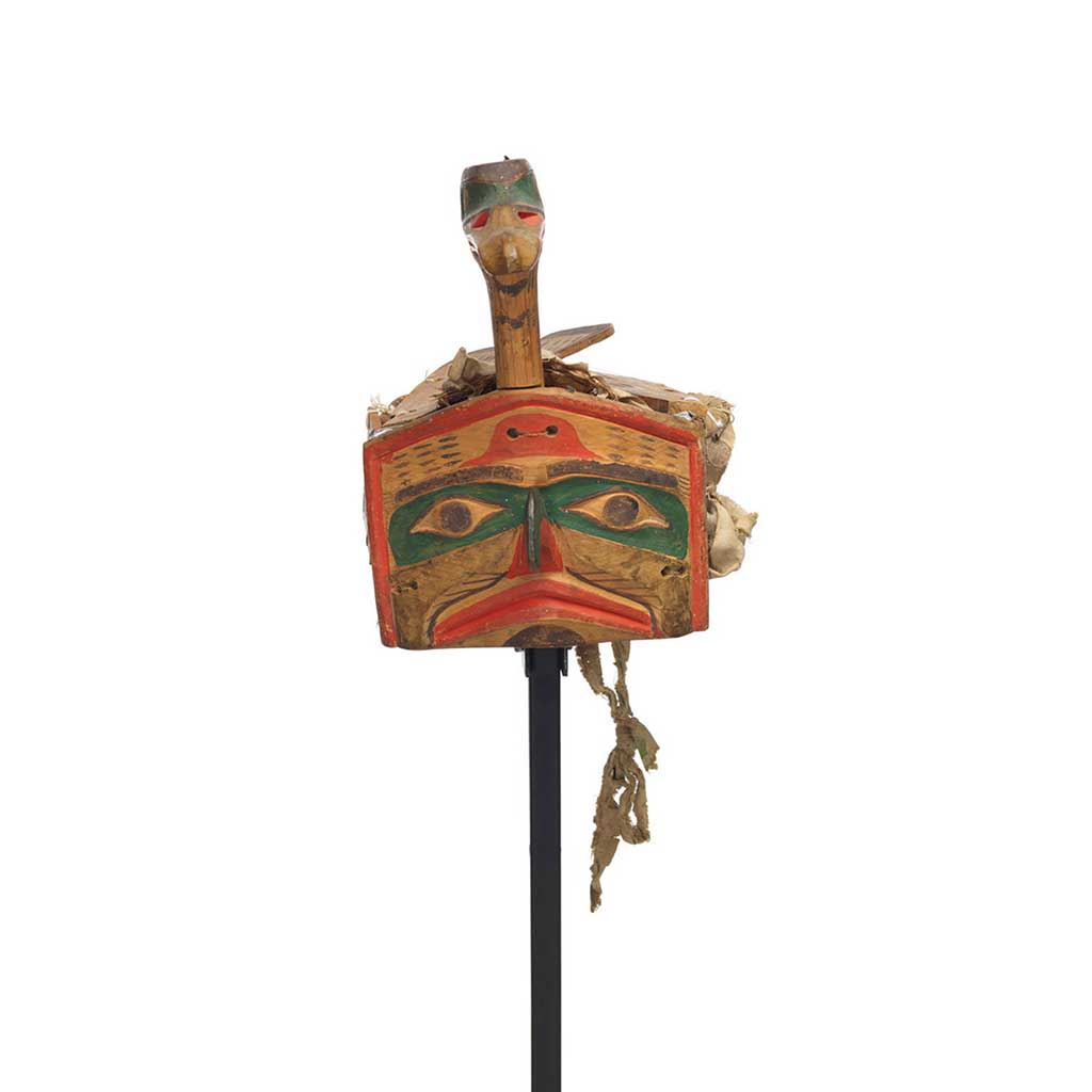 Łałkuxwiwe' or mallard headdress features a mallard head and neck projecting above the hawk face frontlet, carved wooden feathers and wing.