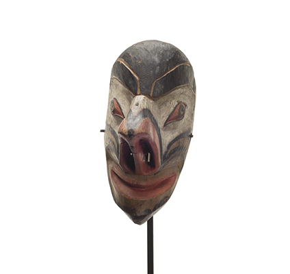 A Nułamał or fool dancer, thin long face, comical expression, very large hooked and upturned nose with long nostrils.